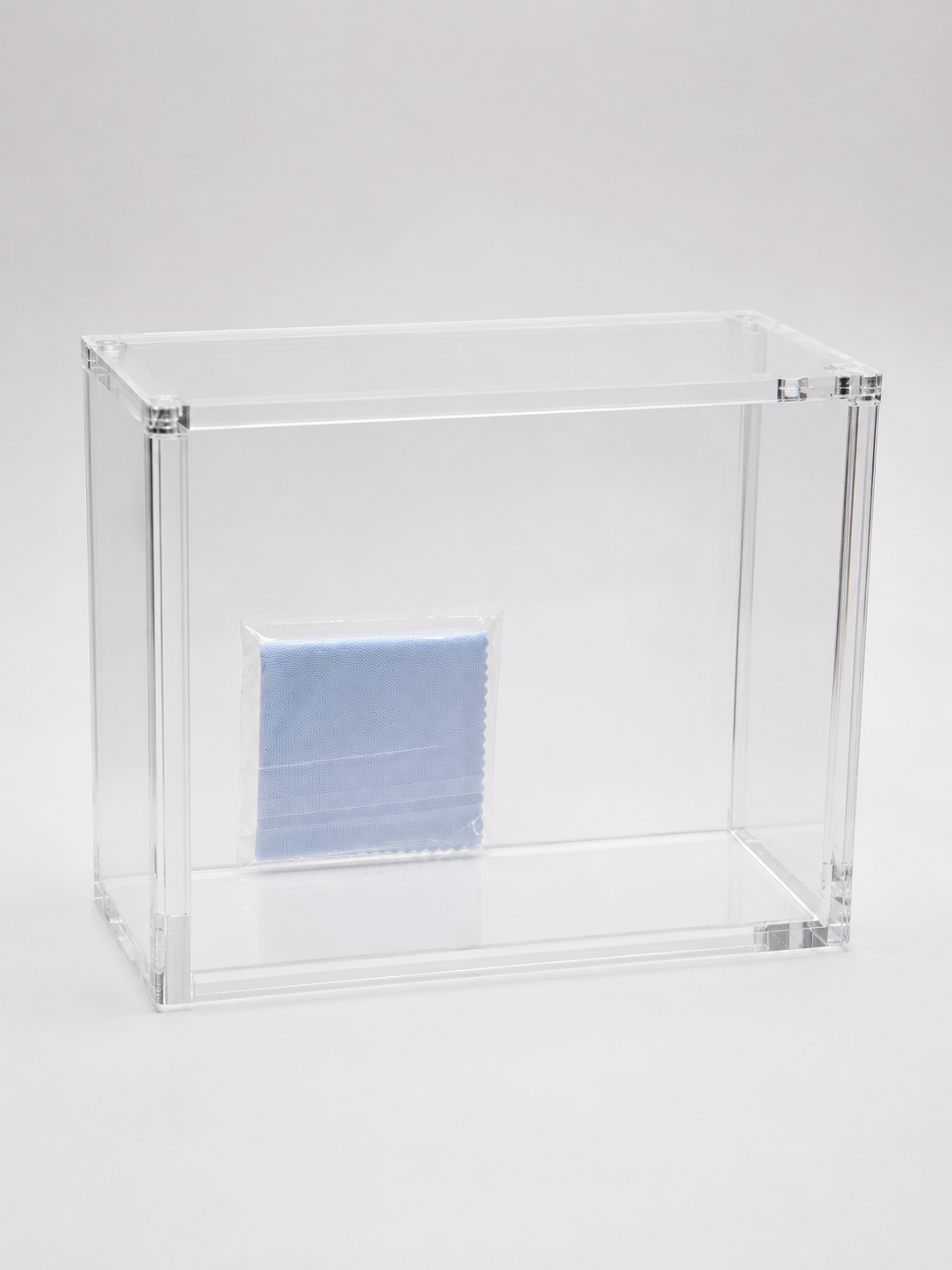 Clear acrylic display case for sealed Pokémon booster boxes, UV-protected magnetic lid, box shown not included — PlayVault UAE